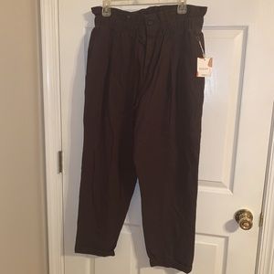 Brown paper bag pants, tags on